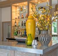 Zinc-topped bar with flower vases