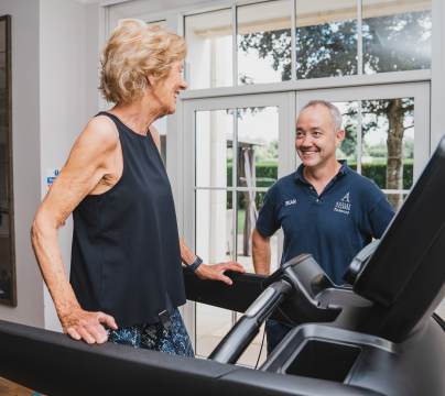 Older woman running on a treadmill