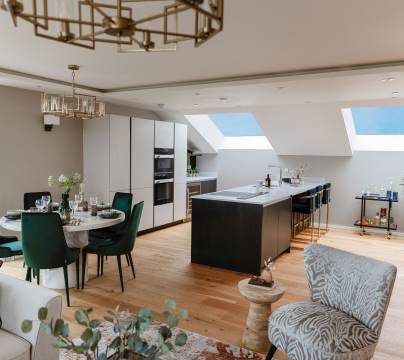 Fitted kitchen in open-plan penthouse